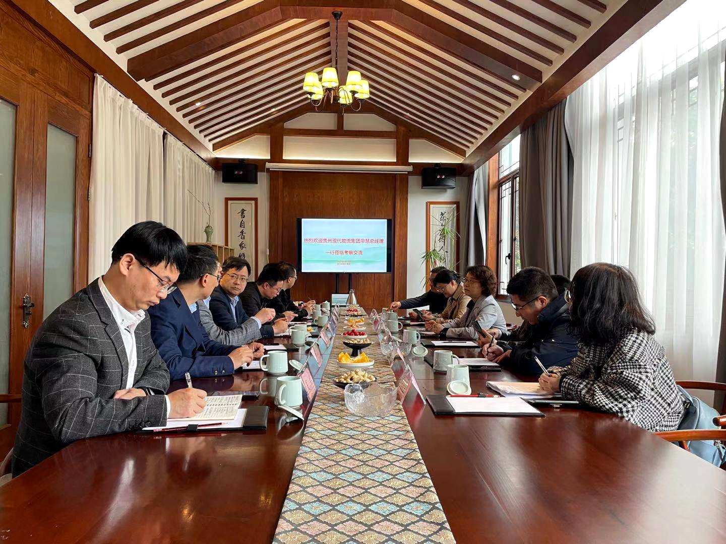 贵州现代物流产业集团党委副书记、总经理廖慧一行莅临九洲(中国)集团考察交流